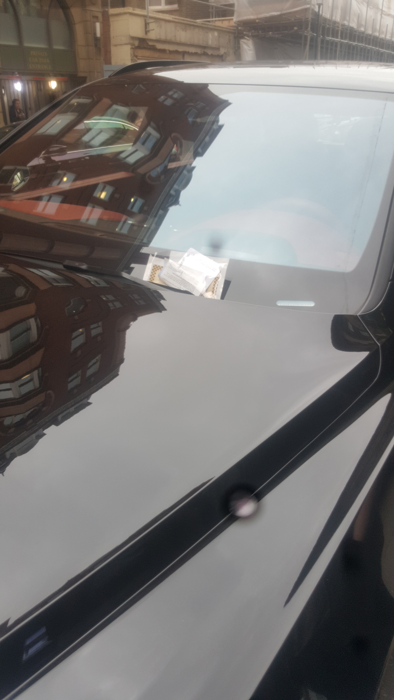 Illustration for article titled Bentayga with parking ticket and others